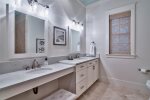 Double vanity with bench in the first floor master bathroom